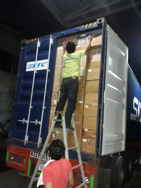 UNLOADING CONTAINER AT RPJ ALABANG FOR FRIDAY AUCTION